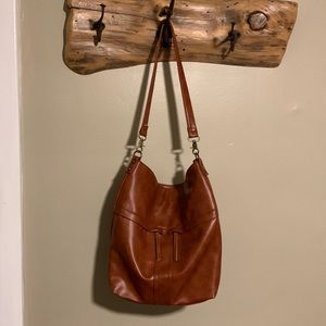Womens brown faux leather purse. Never used.